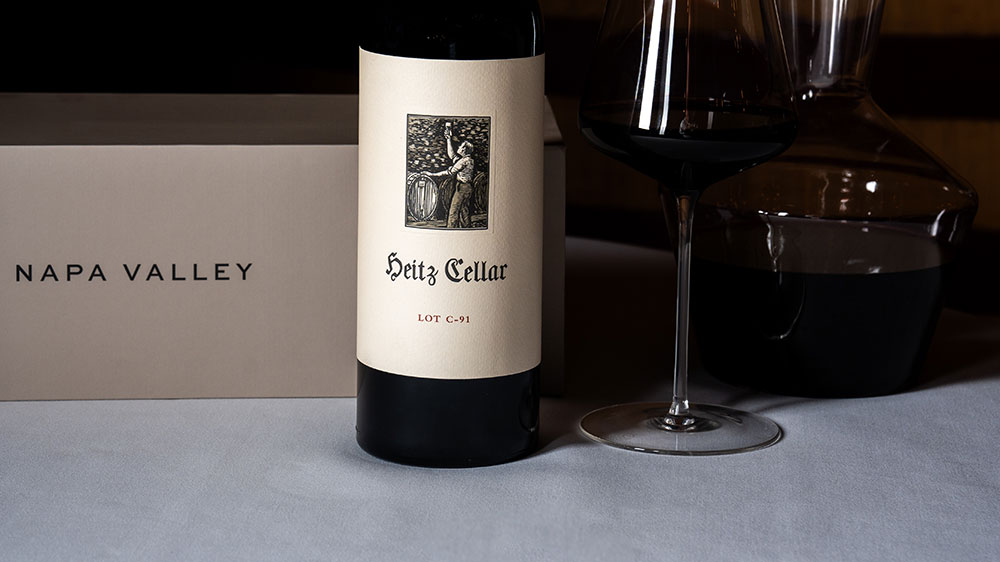 Legacy of Napa Valley: A bottle of 2019 Heitz Cellar Lot C-91 Cabernet Sauvignon on a table with a glass of wine and decanter.