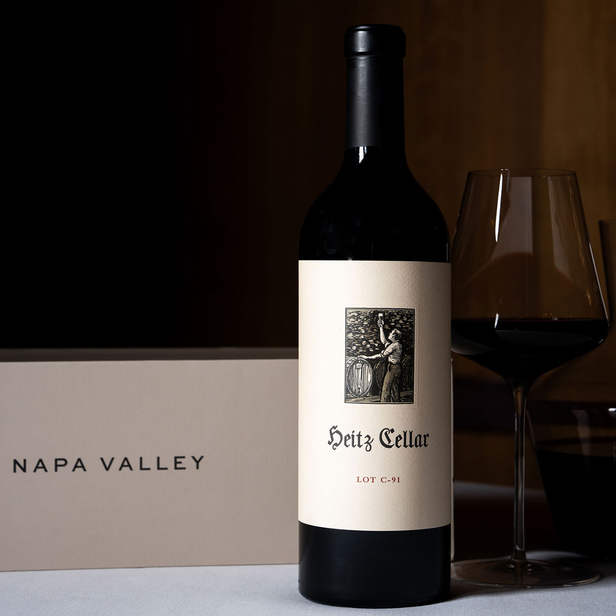 Legacy of Napa Valley: A bottle of 2019 Heitz Cellar Lot C-91 Cabernet Sauvignon on a table with a glass of wine and decanter.